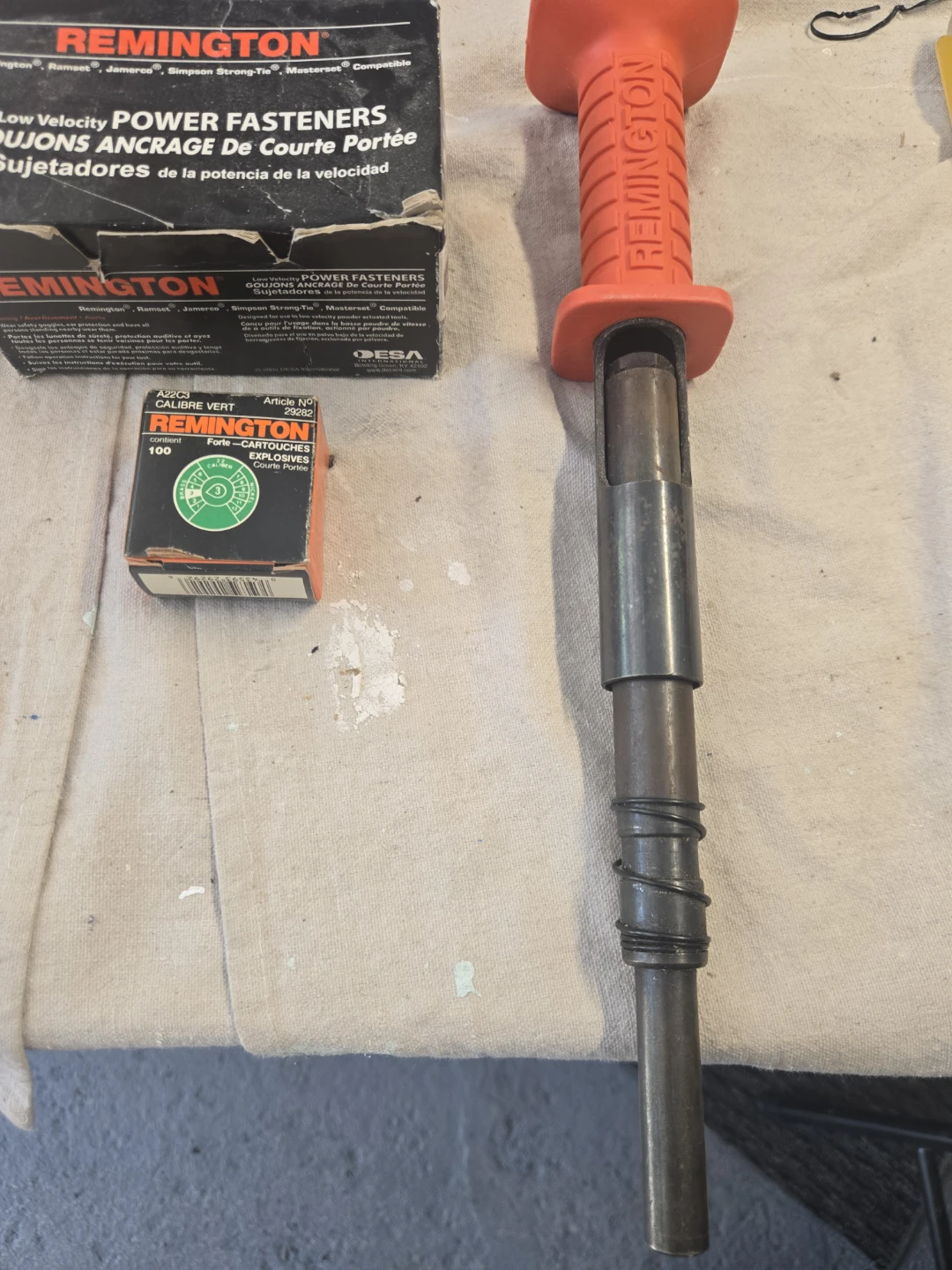 Remington Powder Actuated Tool with Fasteners and Cartridges