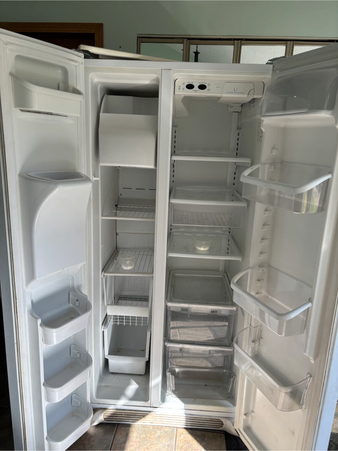Frigidaire Side-by-Side Refrigerator with Water Dispenser