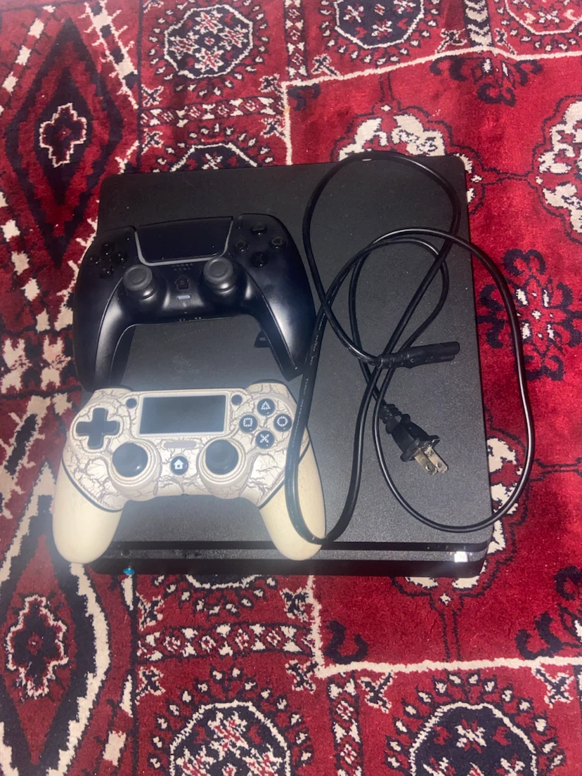 Sony PlayStation 4 Console with 2 Controllers