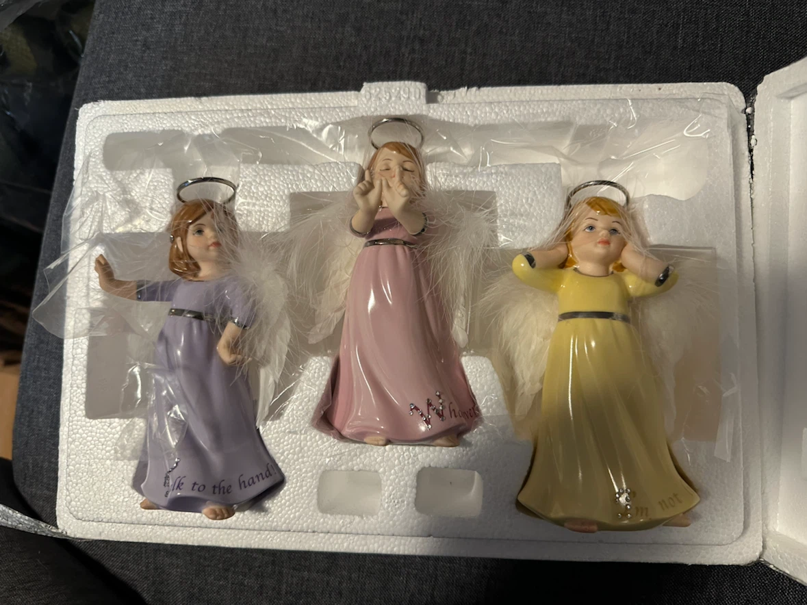 The Bradford Editions Attitude Angels Porcelain Figurines
