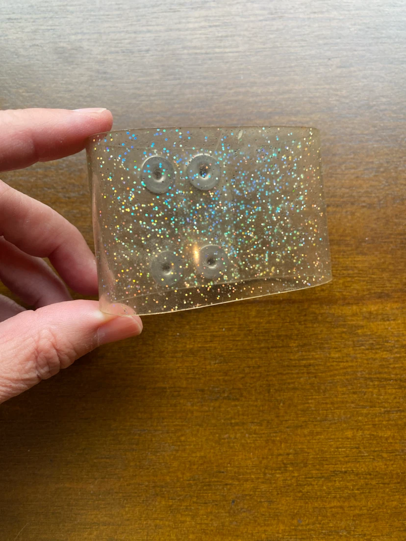 Plastic glittery cuff bracelet