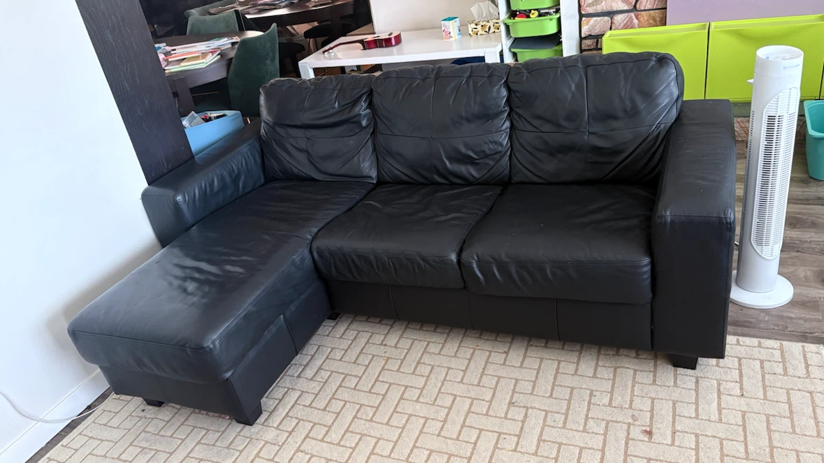 $200 Blk leather L shape couch