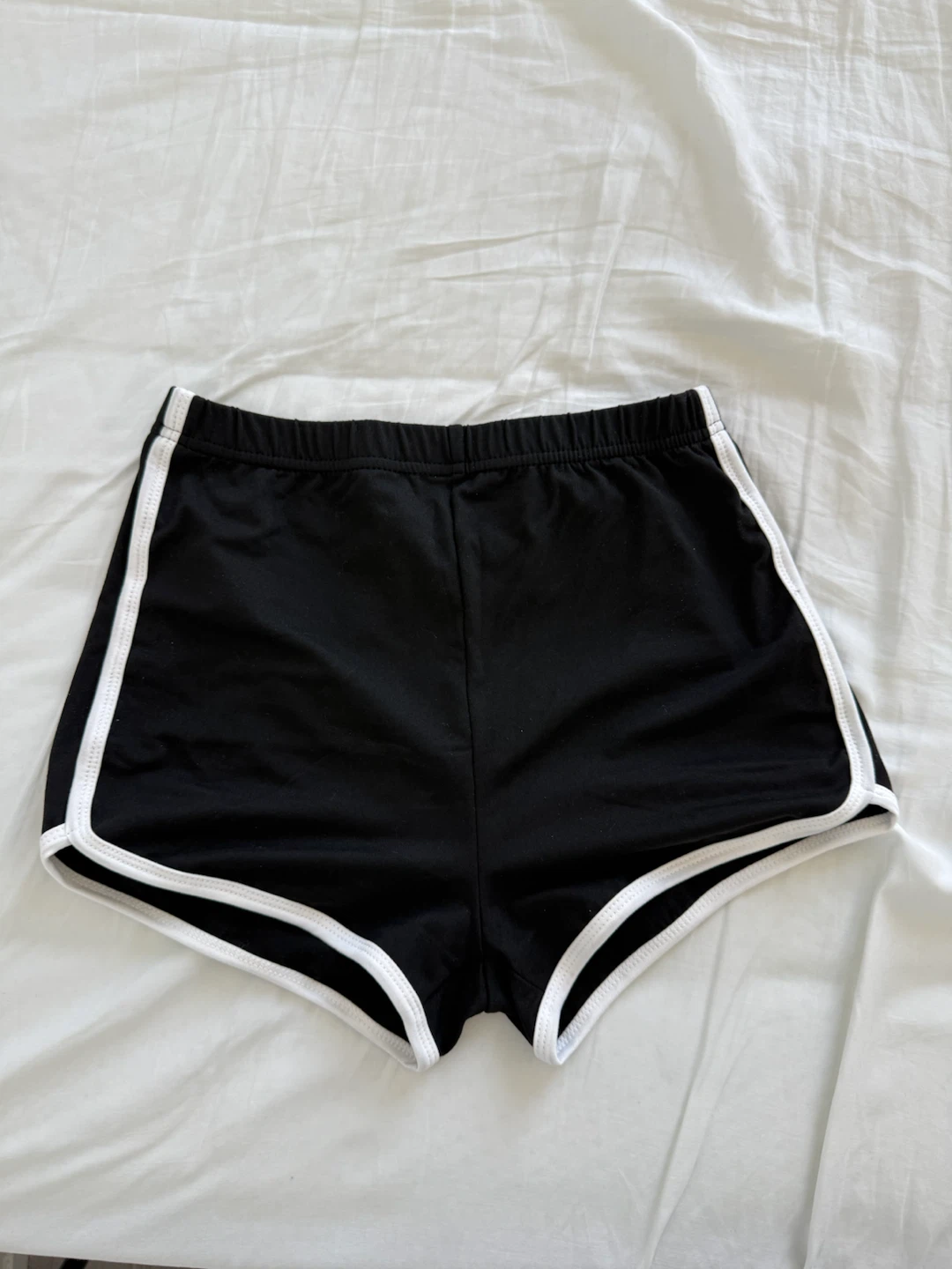 Black athletic shorts with white trim - Size S