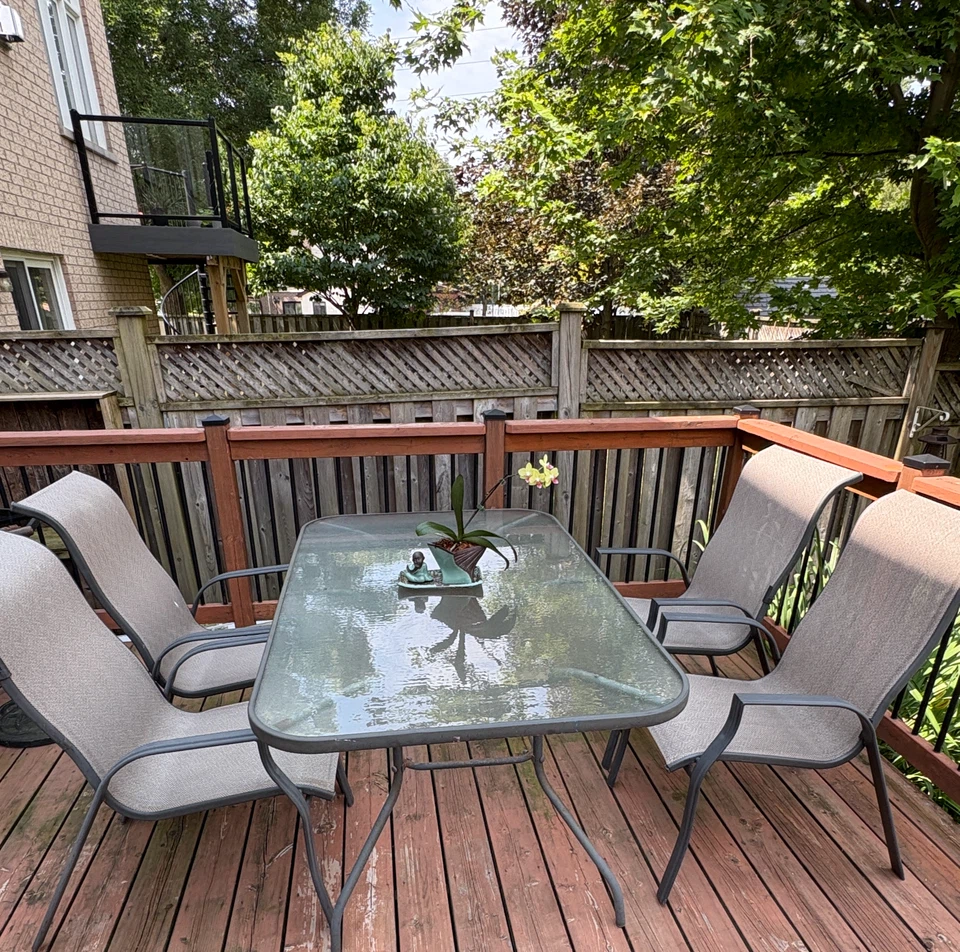 Glass top patio table with 4 chairs