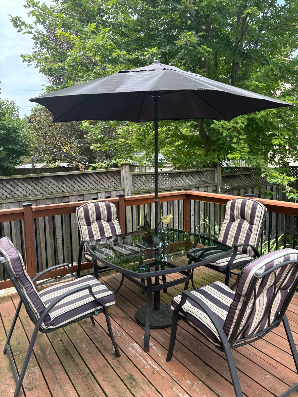 Glass Top Patio Table Set with Umbrella and Cushioned Chairs - photo 3