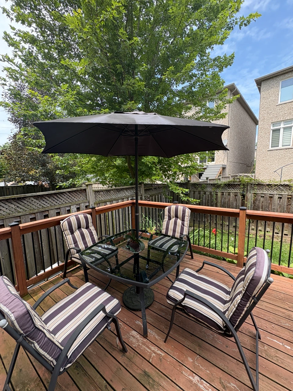 Glass Top Patio Table Set with Umbrella and Cushioned Chairs - photo 5
