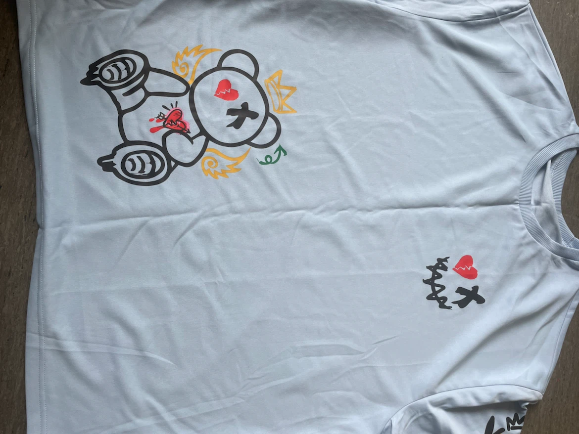 Light Blue Graphic T-Shirt with Bear Design