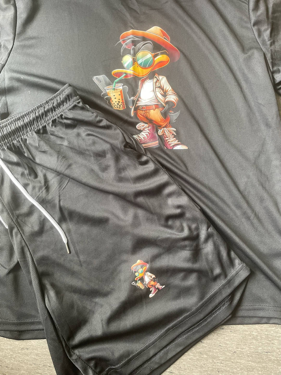 Black T-shirt and Shorts Set with Cartoon Duck Graphic