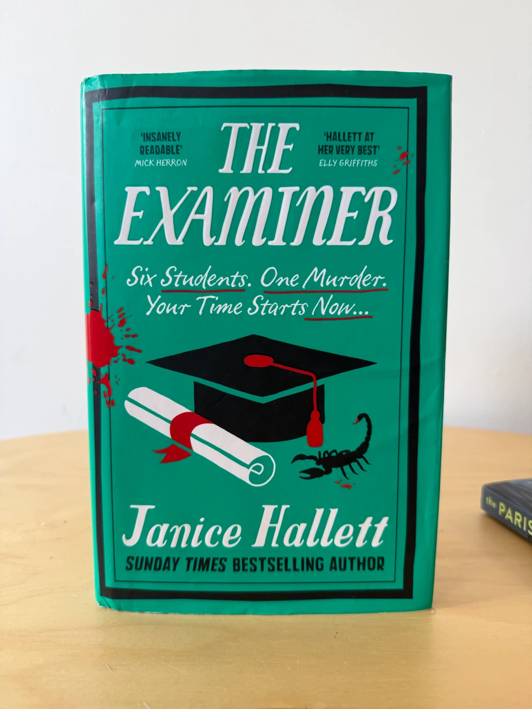 The Examiner by Janice Hallett Book
