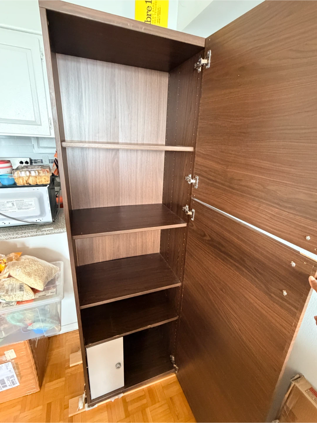 Tall dark brown storage cabinet with shelves - photo 3