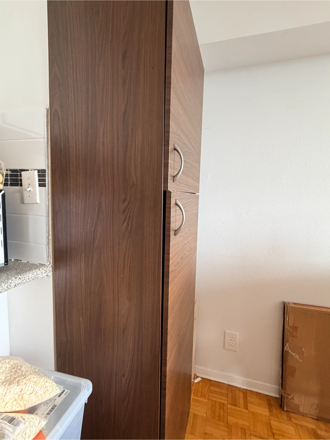 Tall dark brown storage cabinet with shelves - photo 4