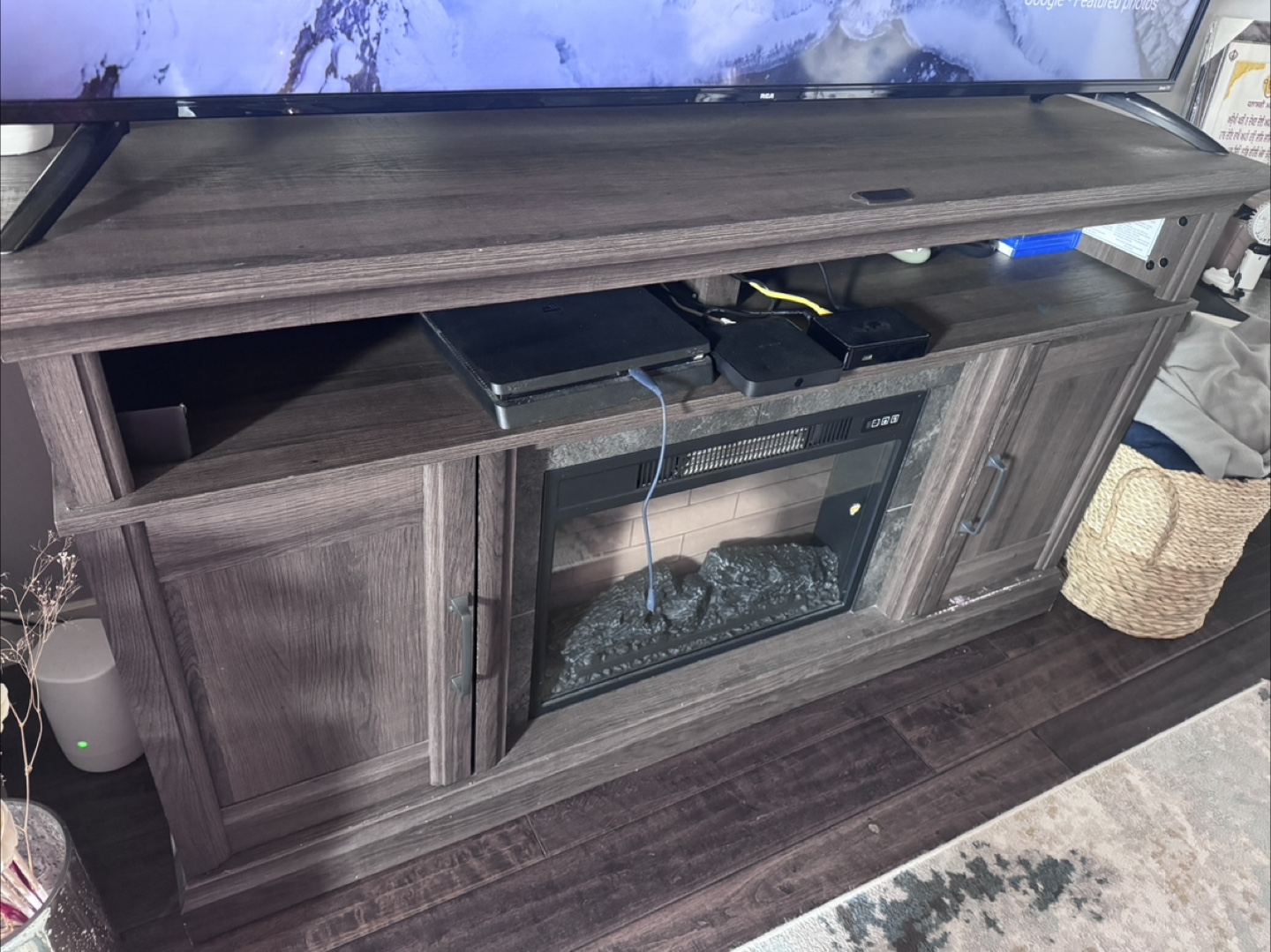 Moving sale- Dark Wood Entertainment Unit with Fireplace - photo 2