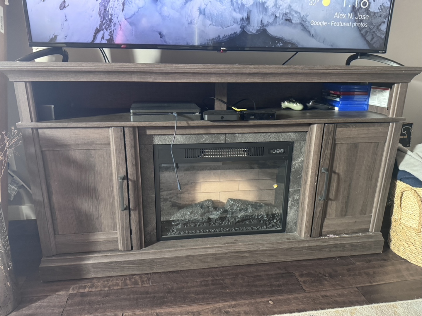 Moving sale- Dark Wood Entertainment Unit with Fireplace