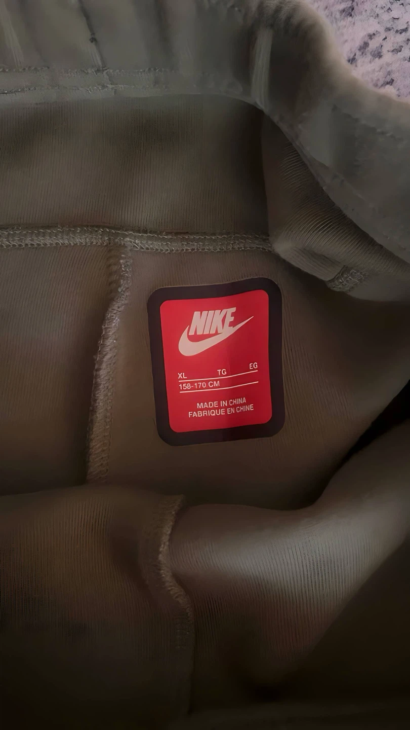Olive green NIKE TECH sweatpants - photo 2