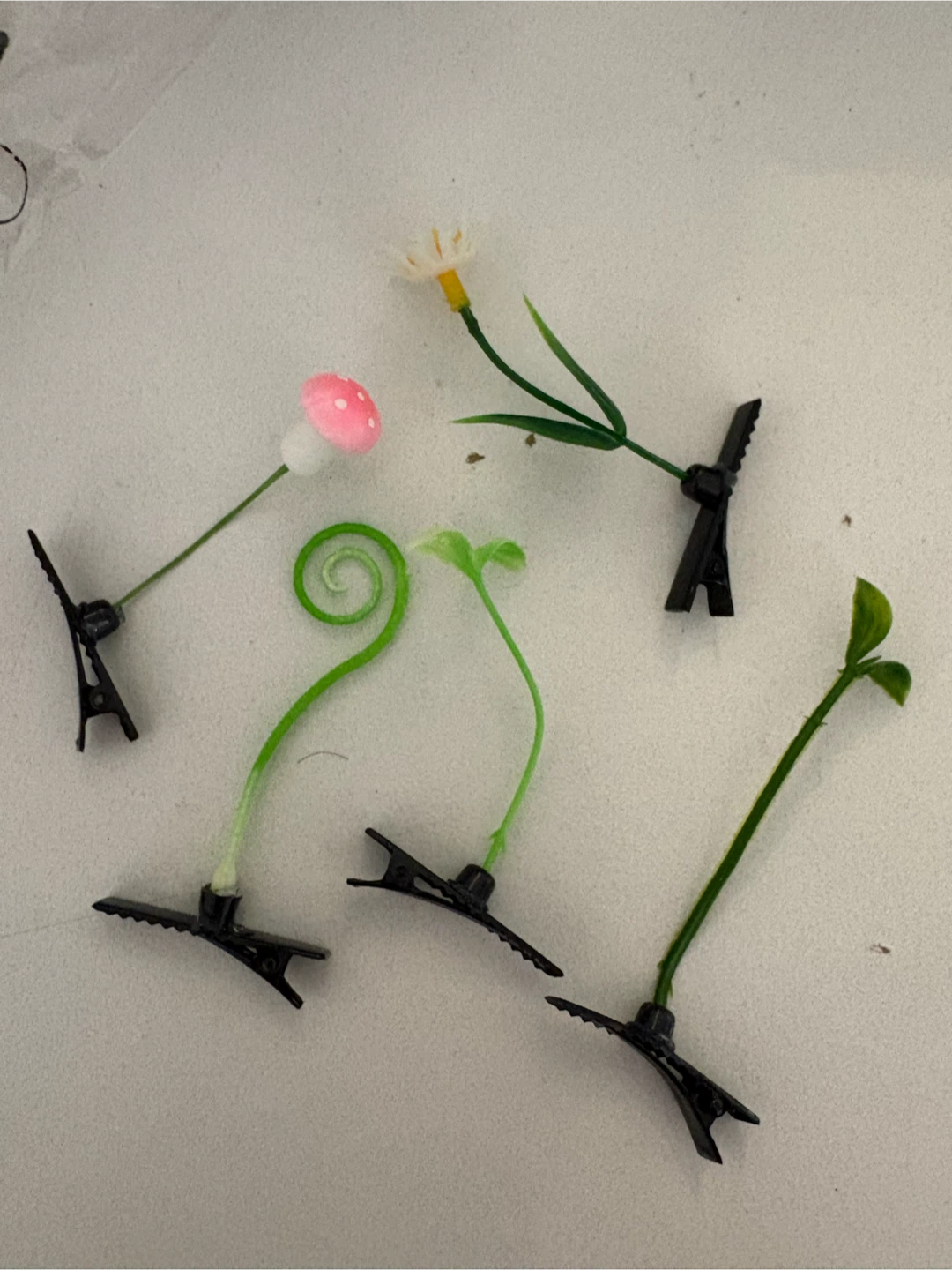 Ariana Grande petal hair clips