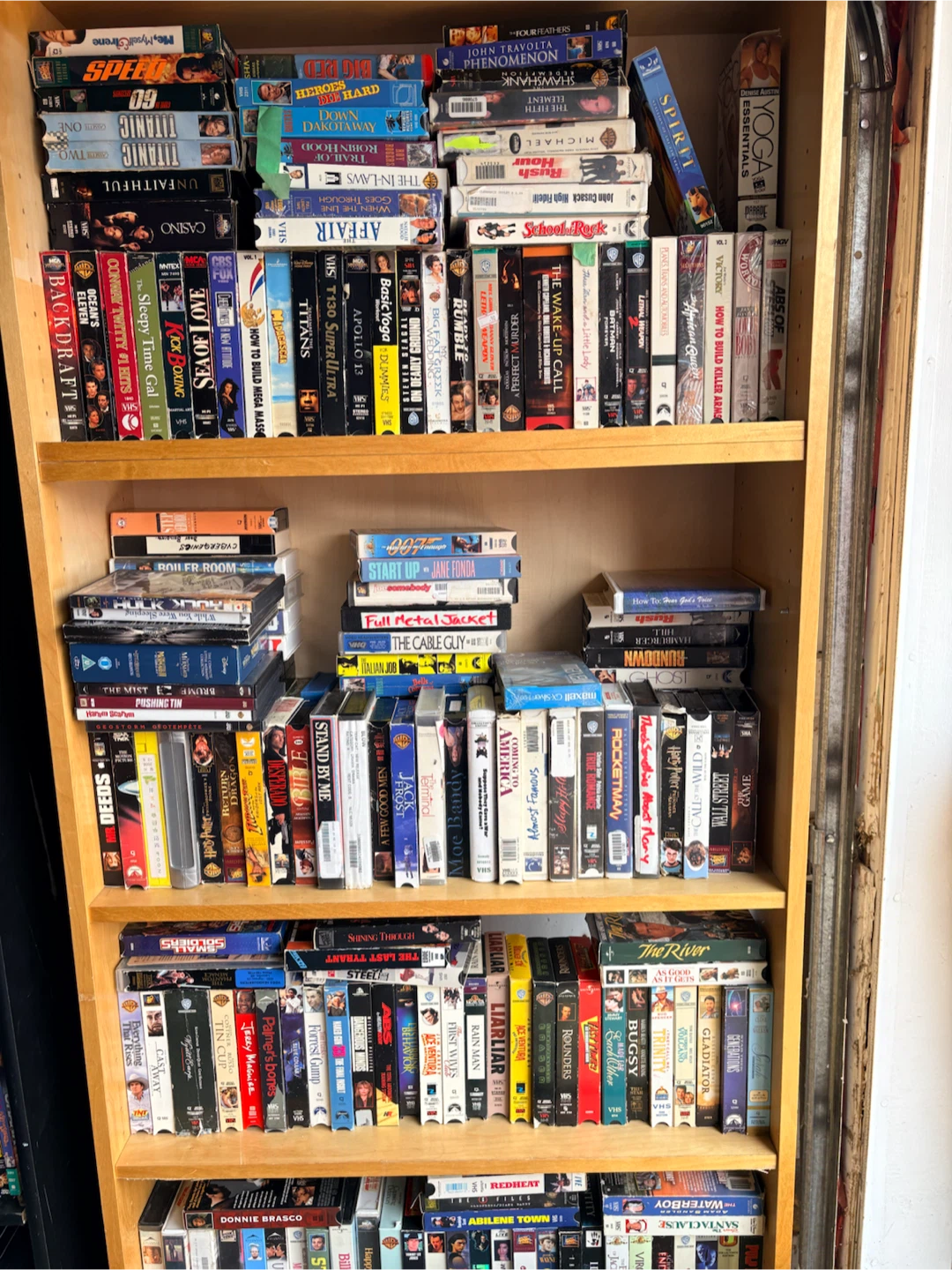 Assorted VHS, DVDs, cassette tapes