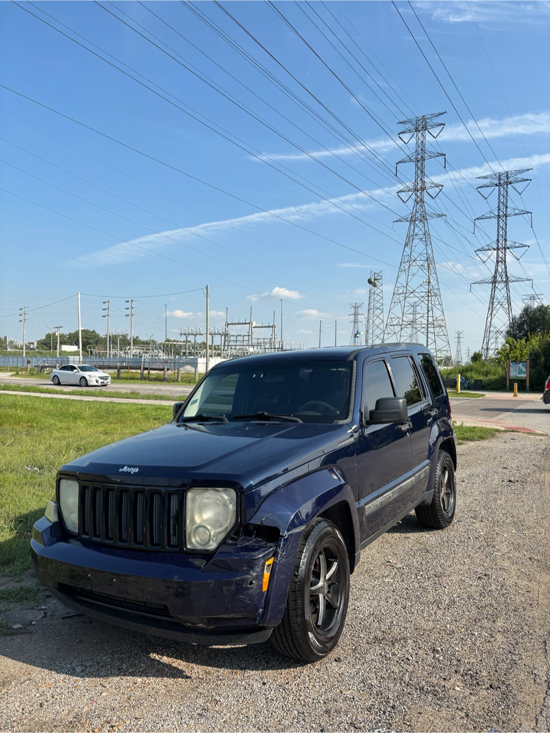 Dark Blue Jeep Liberty SUV