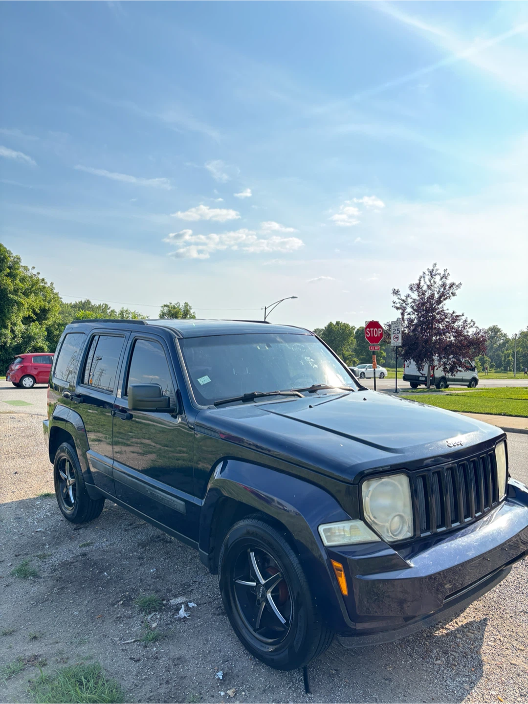 Dark Blue Jeep Liberty SUV - photo 2