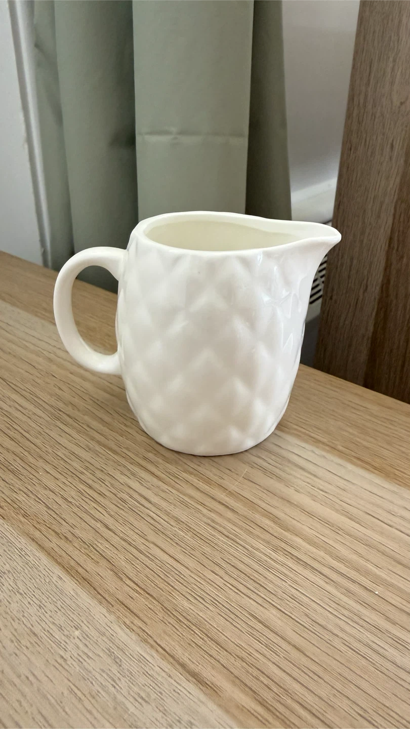 Never used cute little white ceramic creamer