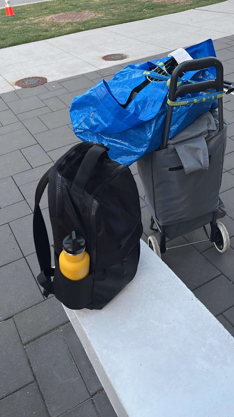 Black backpack with yellow water bottle