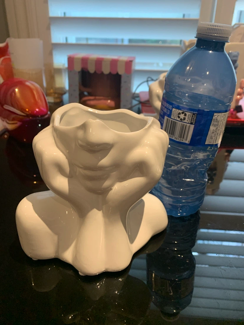 White Ceramic Vase with bottom half of face and hands