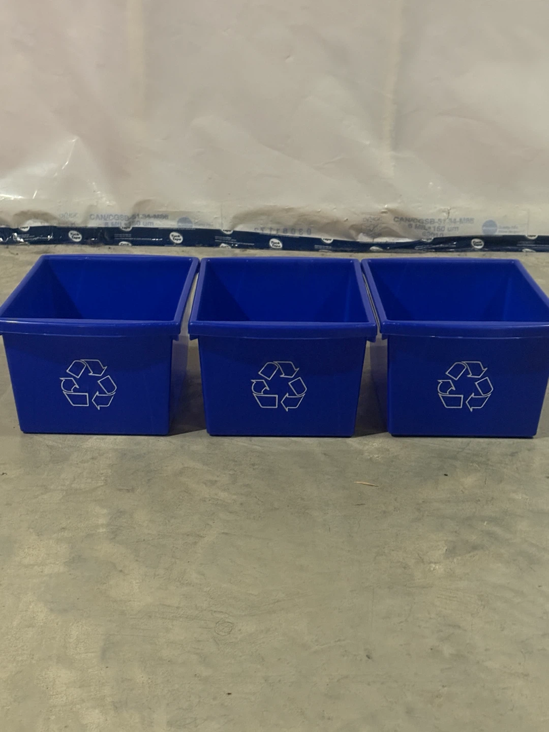 3 Blue Recycling Bins with Recycle Symbol