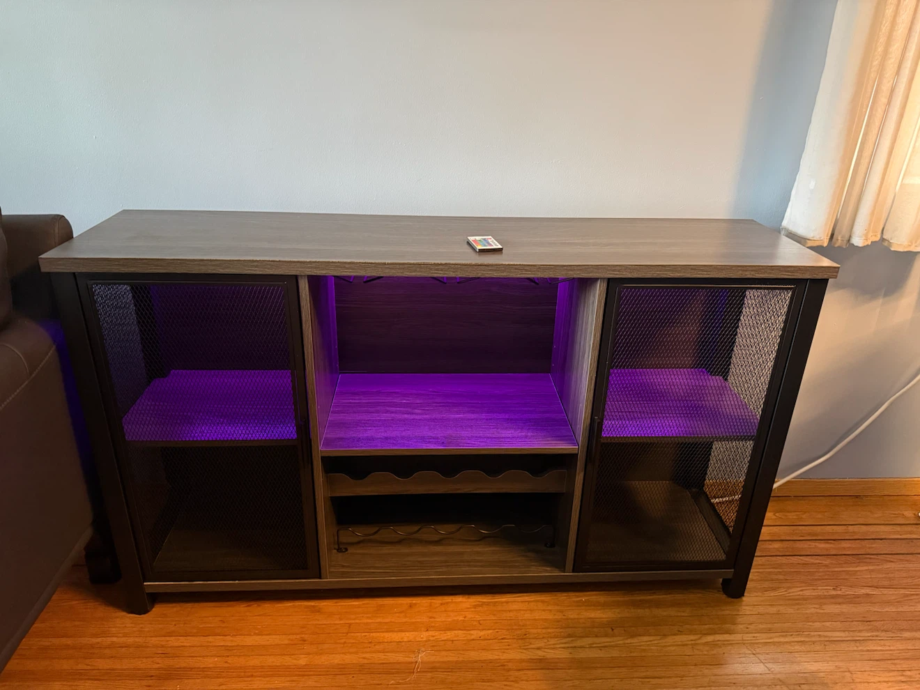 Balbur 55.5" Bar Cabinet with LED Lights & Remote by Wade Logan
