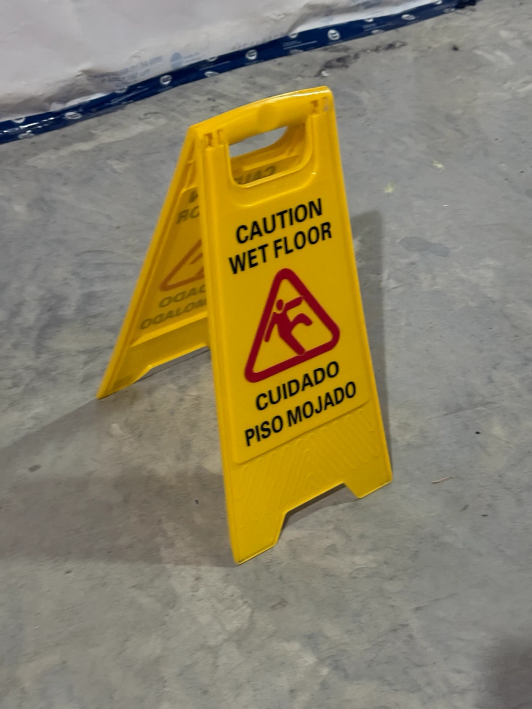 Yellow Wet Floor Caution Sign