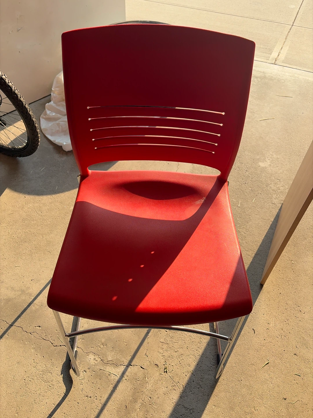 Red Stacking Chair- moving sale