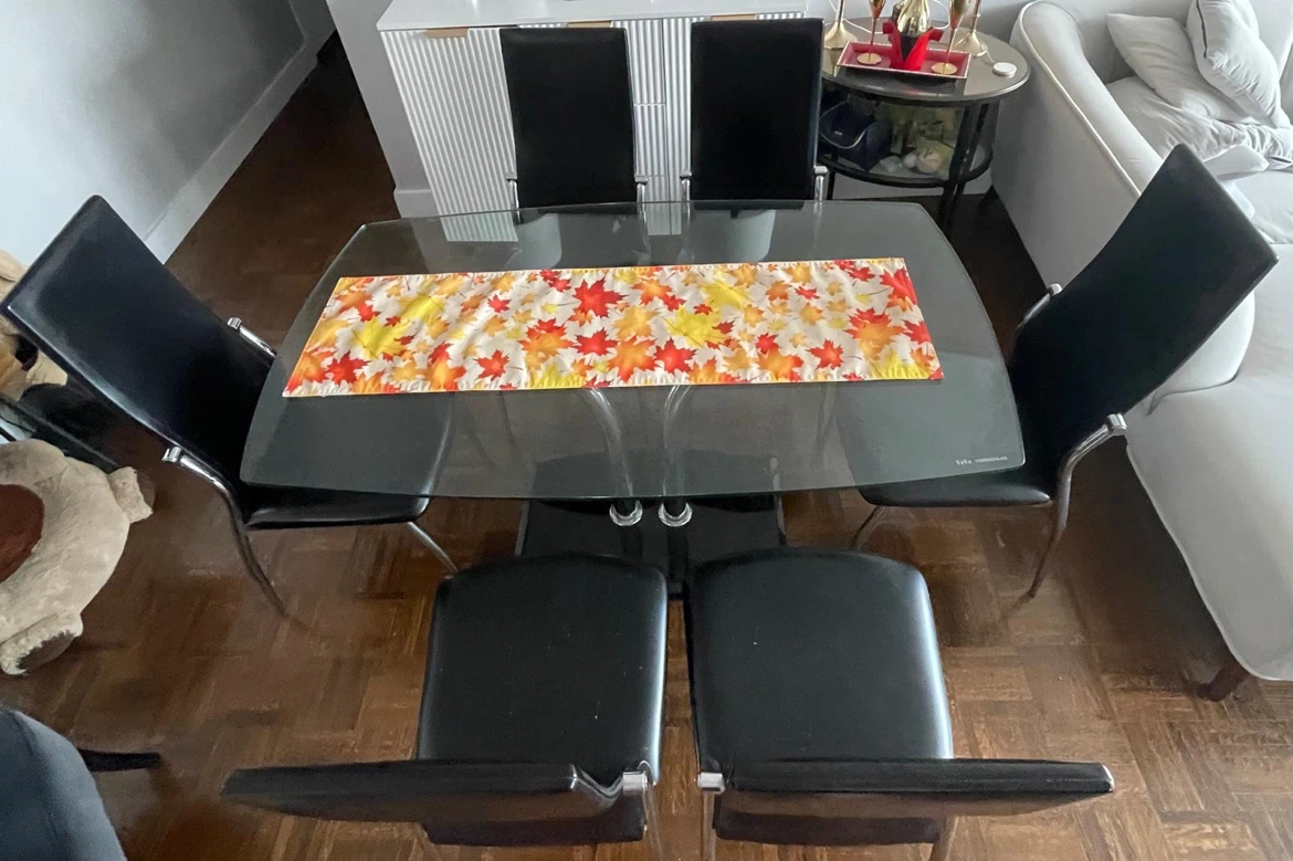Glass Dining Table with 6 Black Chairs