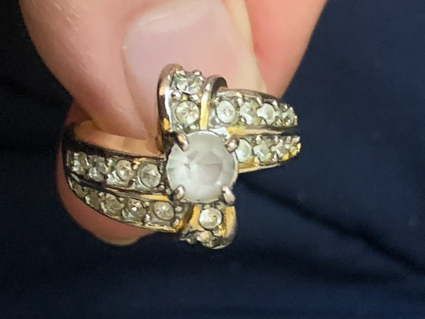 Gold-tone ring with clear stones