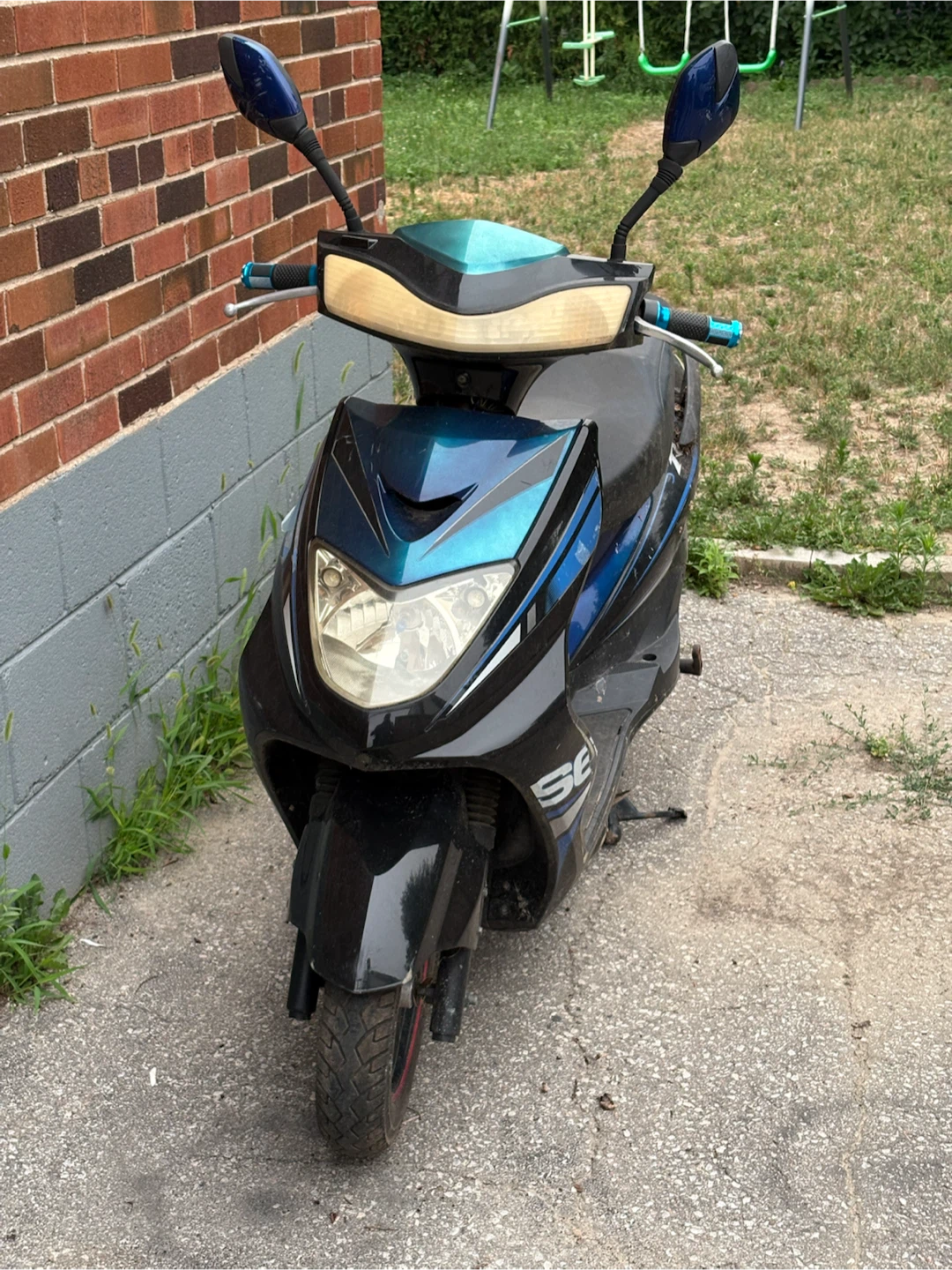 Black Scooter with Blue Accents