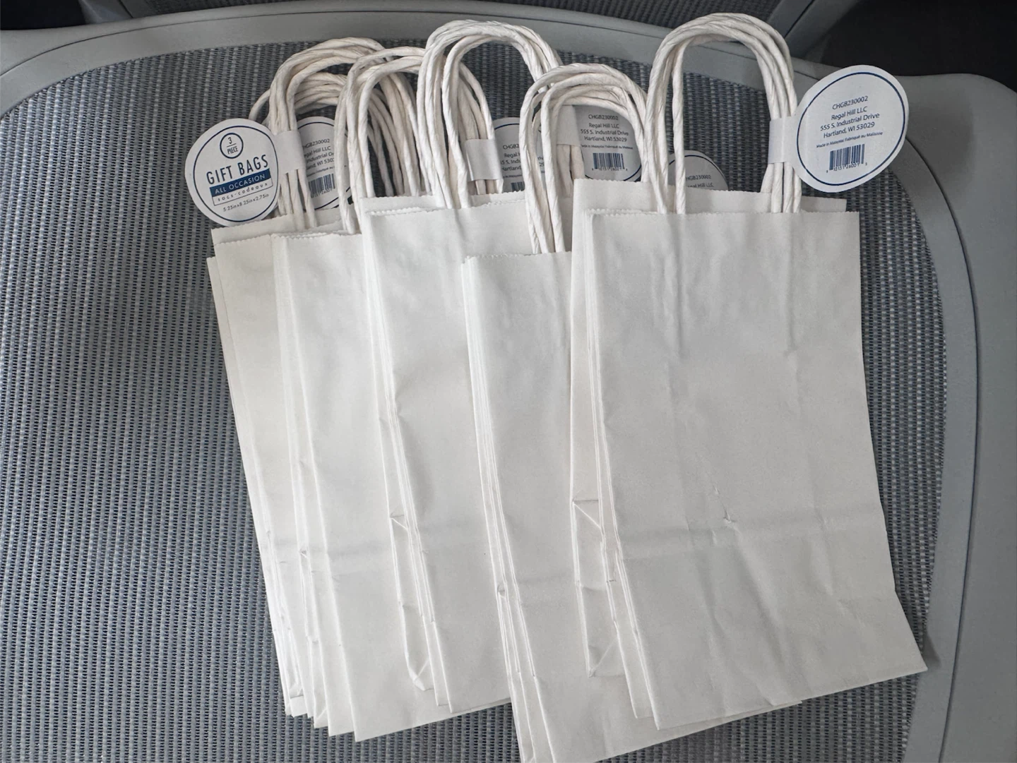 18 white goodie bags