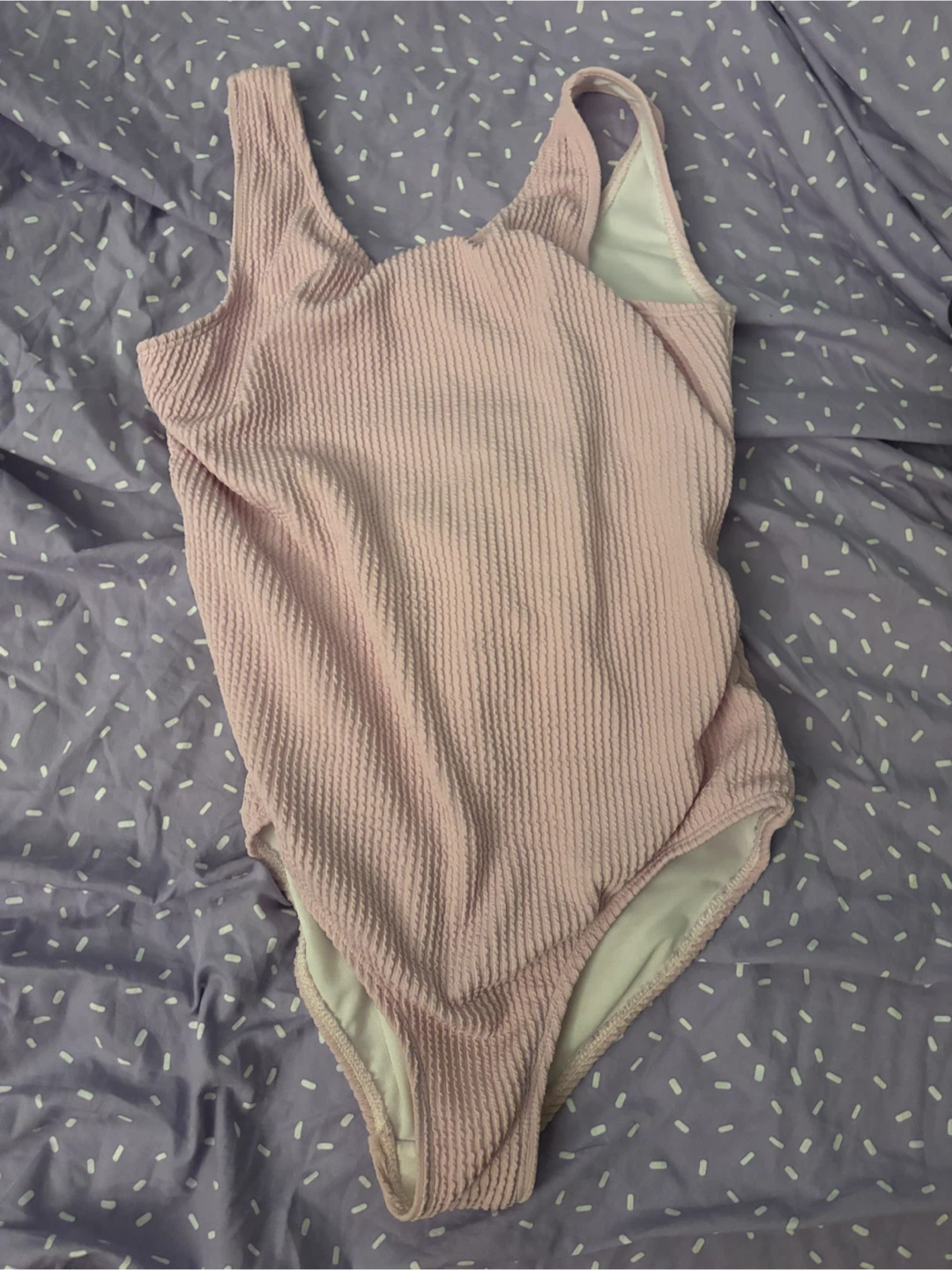 Pink ribbed one-piece swimsuit