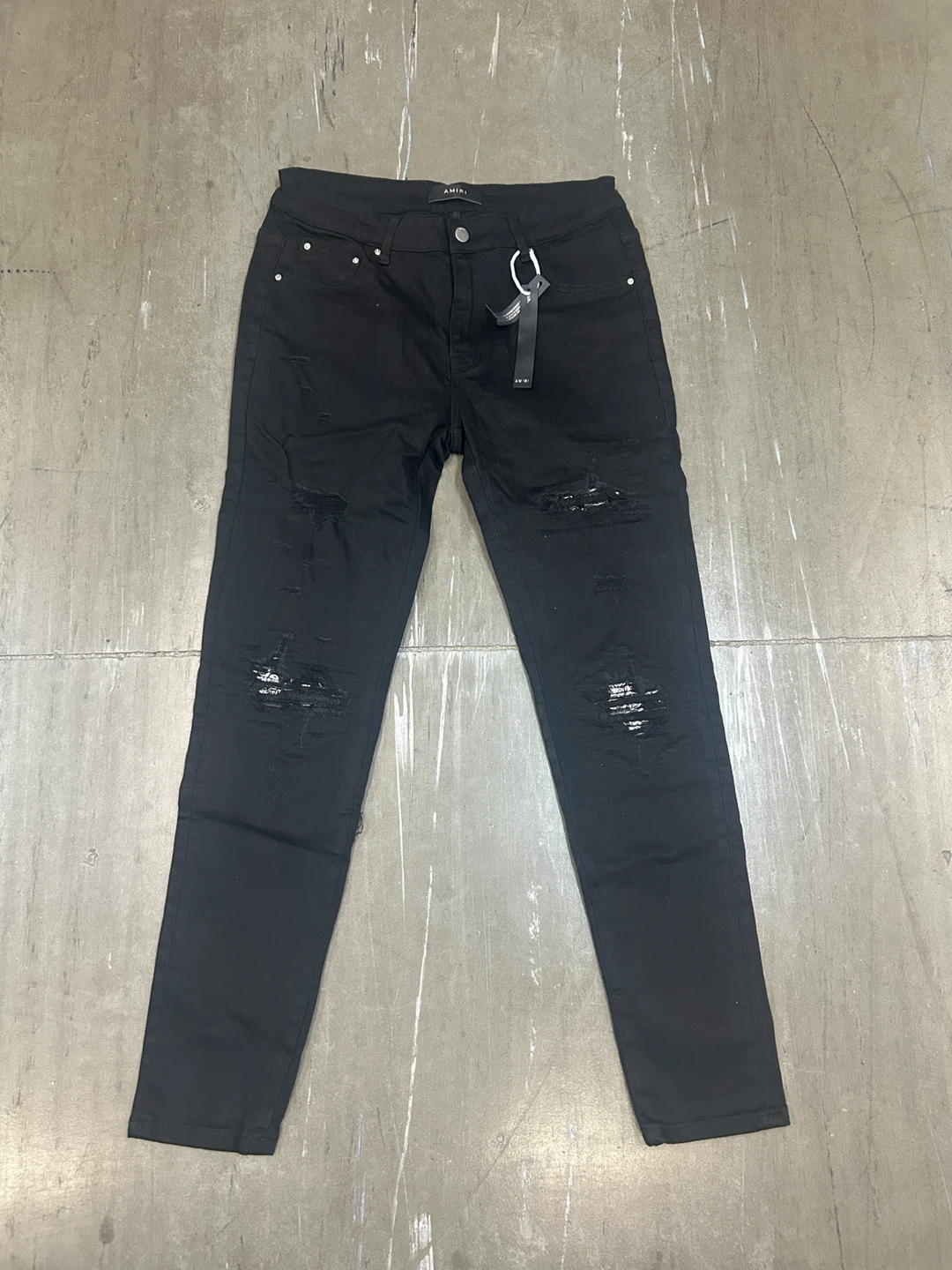 AMIRI Black Distressed Skinny Jeans