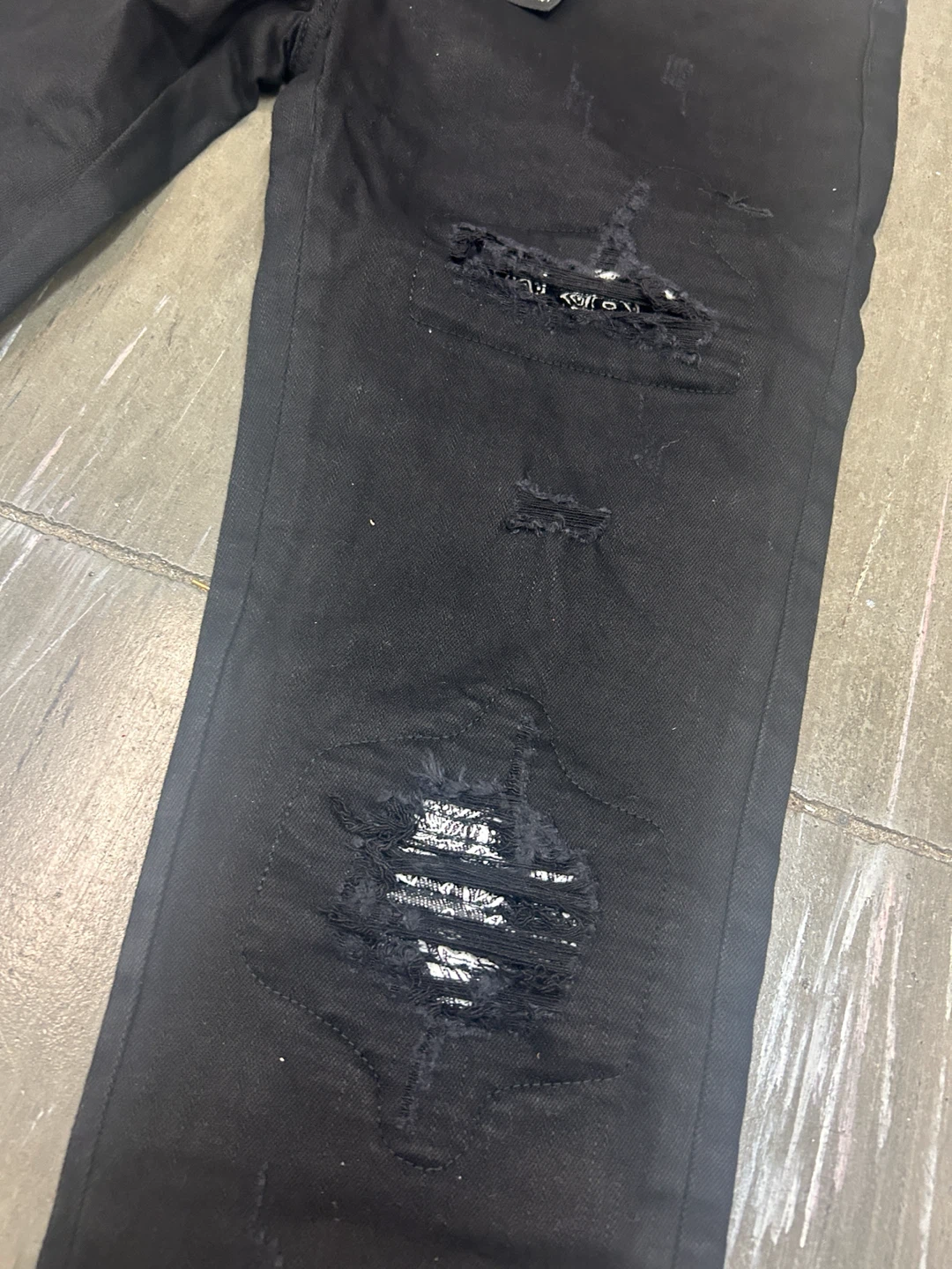 AMIRI Black Distressed Skinny Jeans - photo 4