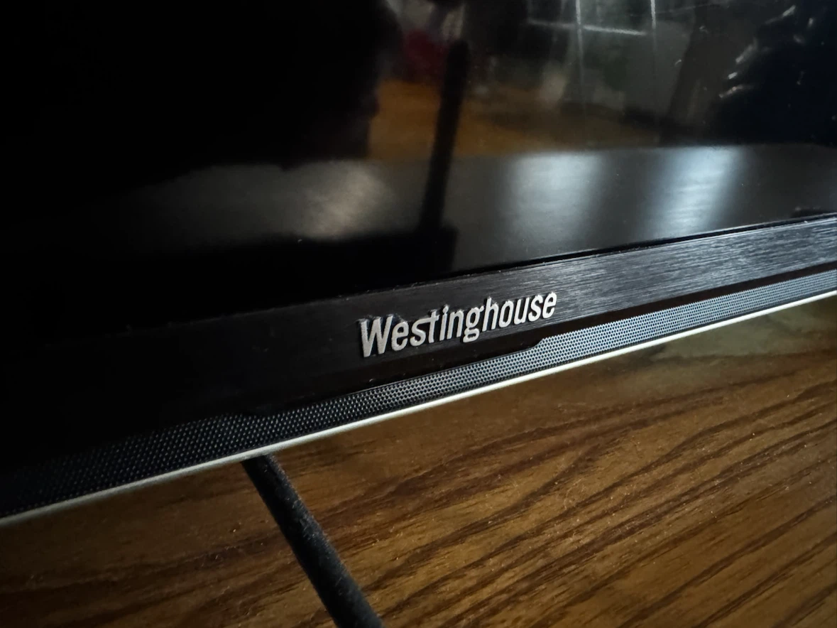 Westinghouse TV and TV stand - photo 4