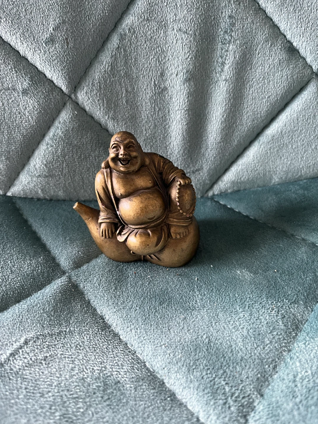 Laughing Buddha Figurine’s