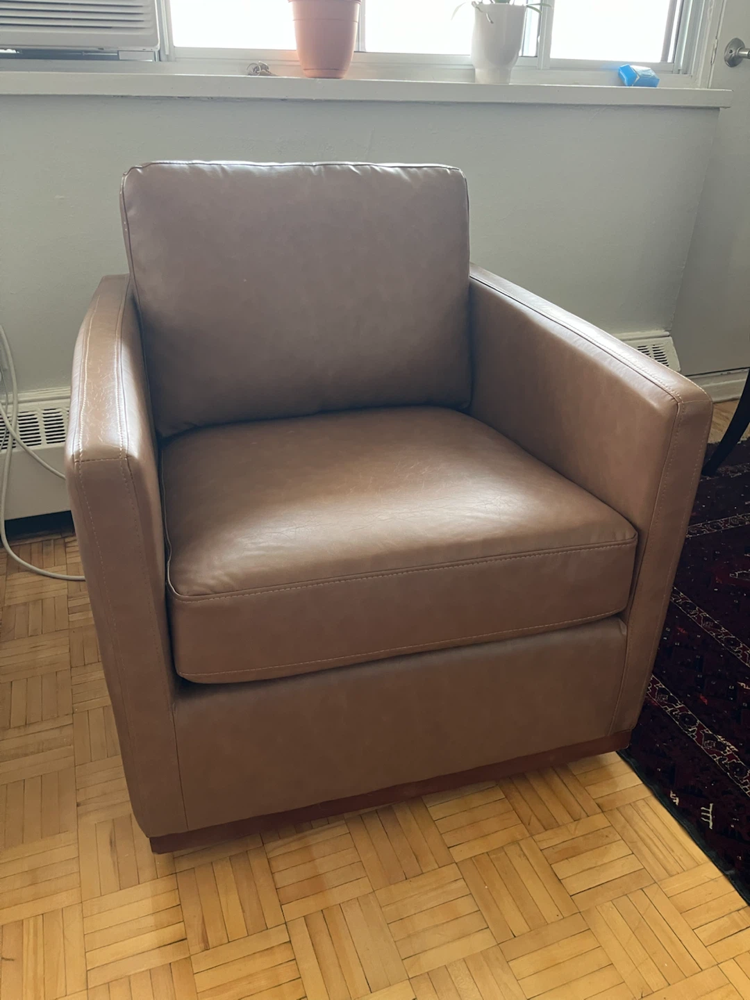 Brand swivel 360 new in box Brown Leather Accent Chair
