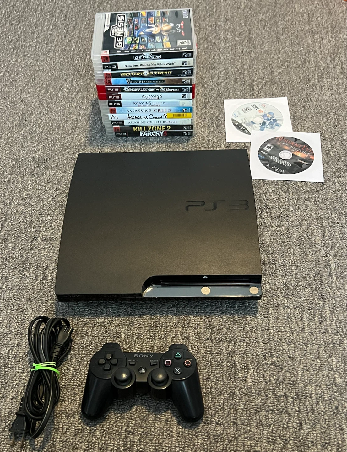 Sony PlayStation 3 (PS3) with Games and Controller