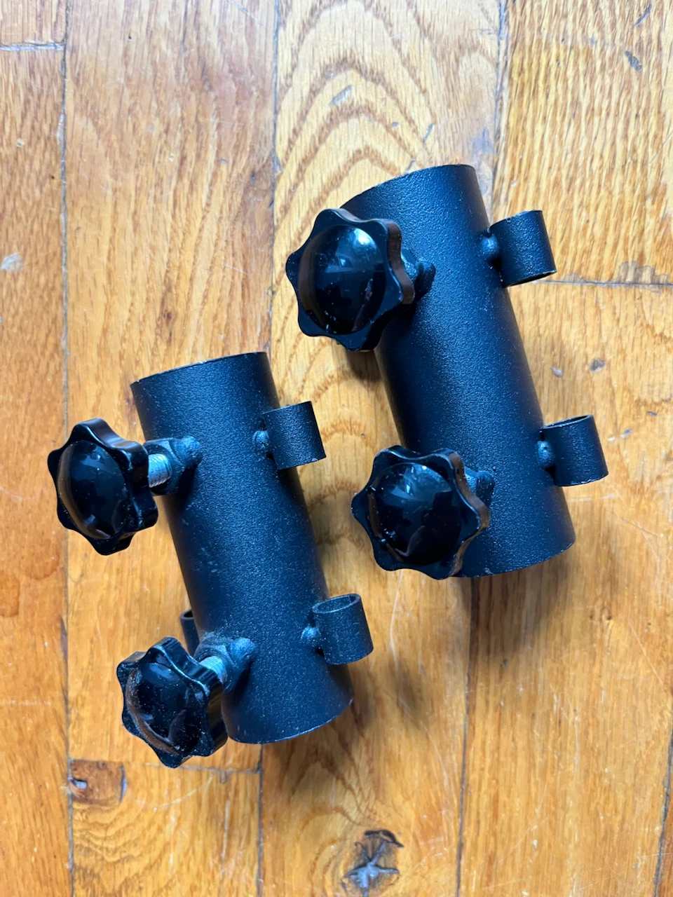 Pair of Black Metal Tent Pole Holders
