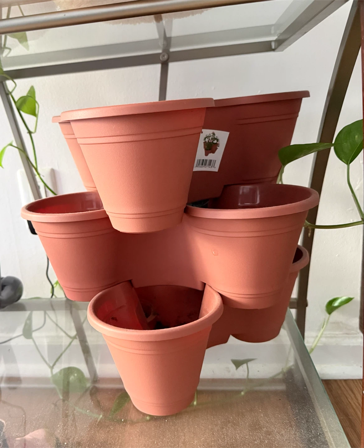Selling a Plastic planter with 9 planters