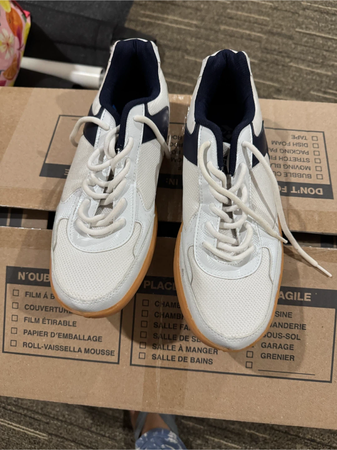 White and navy athletic shoes