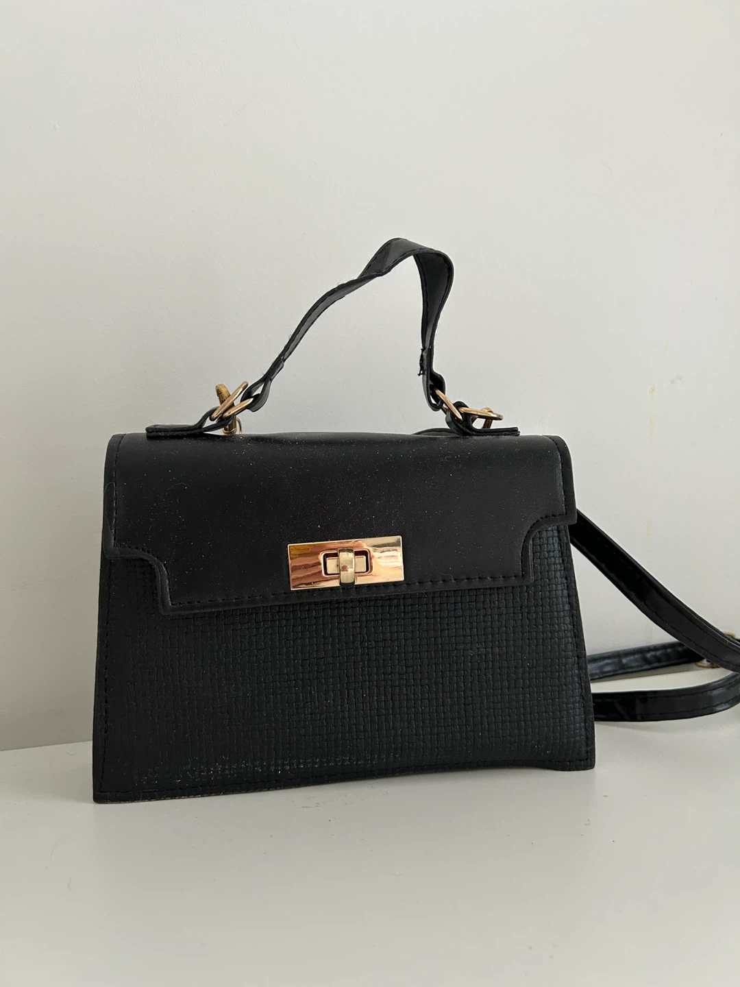 Black mini twist lock square bag