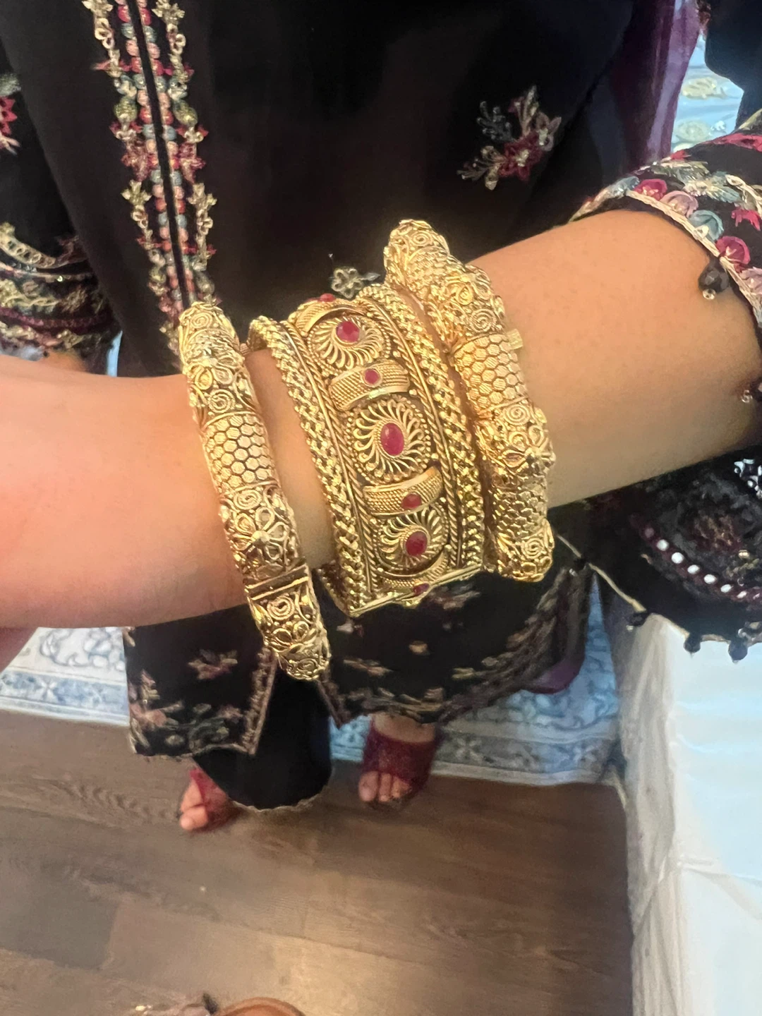 Set of Gold Bangles with Red Stones