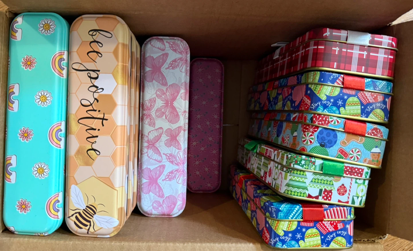 Set of decorative tin boxes with various designs