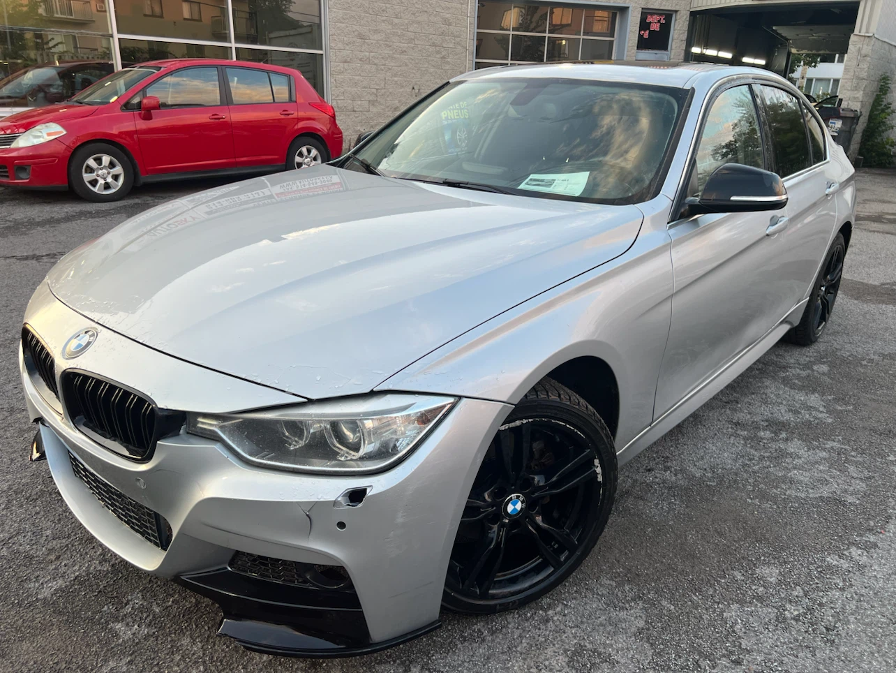 Silver BMW 328i xDrive Sedan