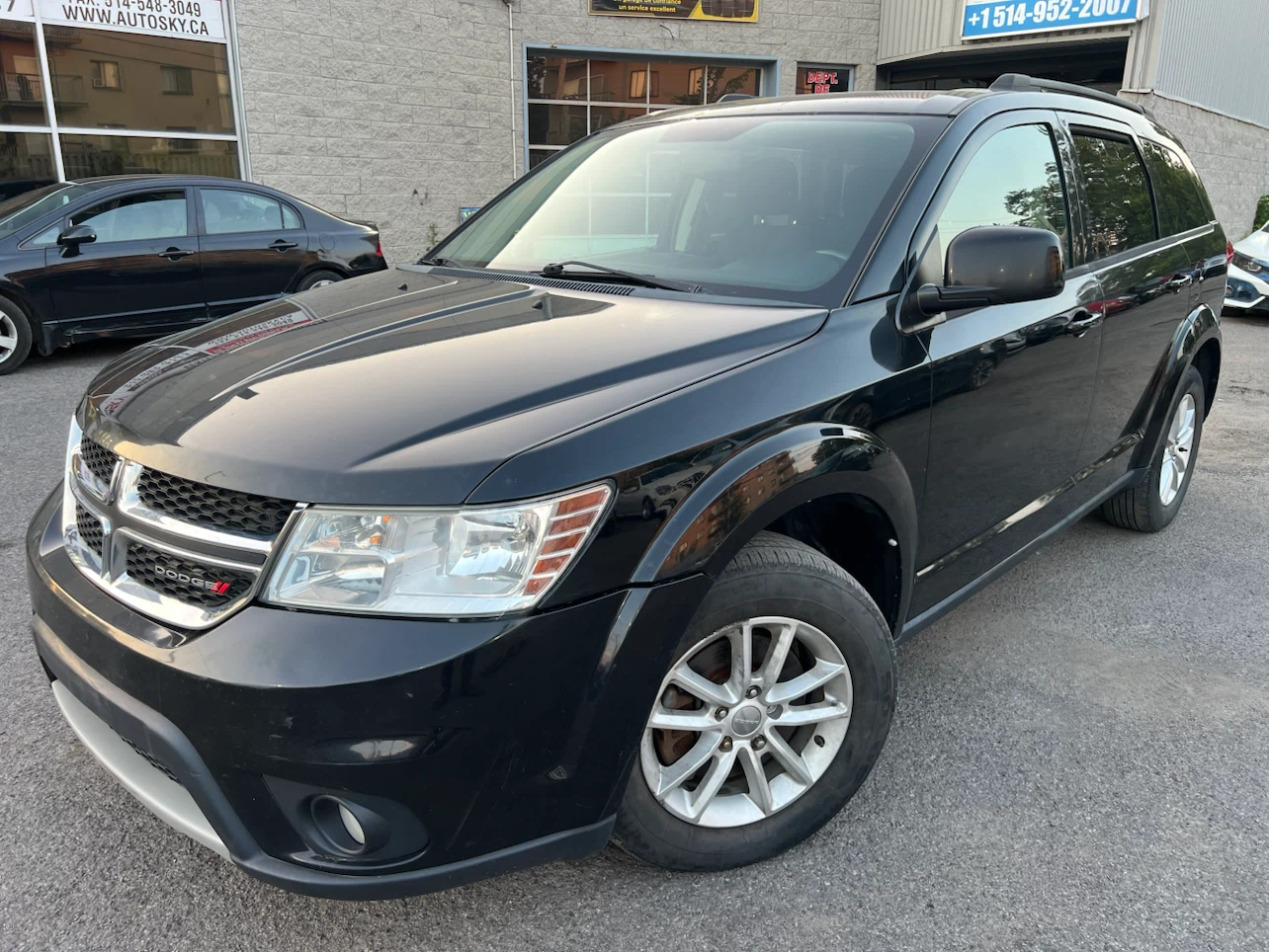 Black Dodge Journey SXT SUV
