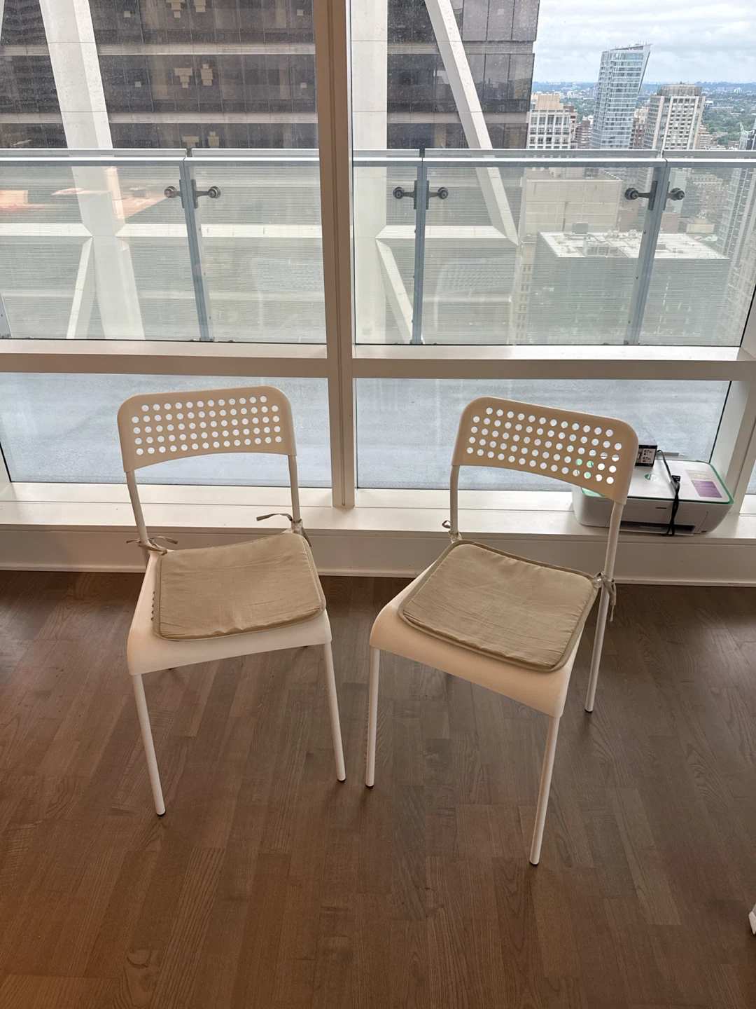 Three white chairs