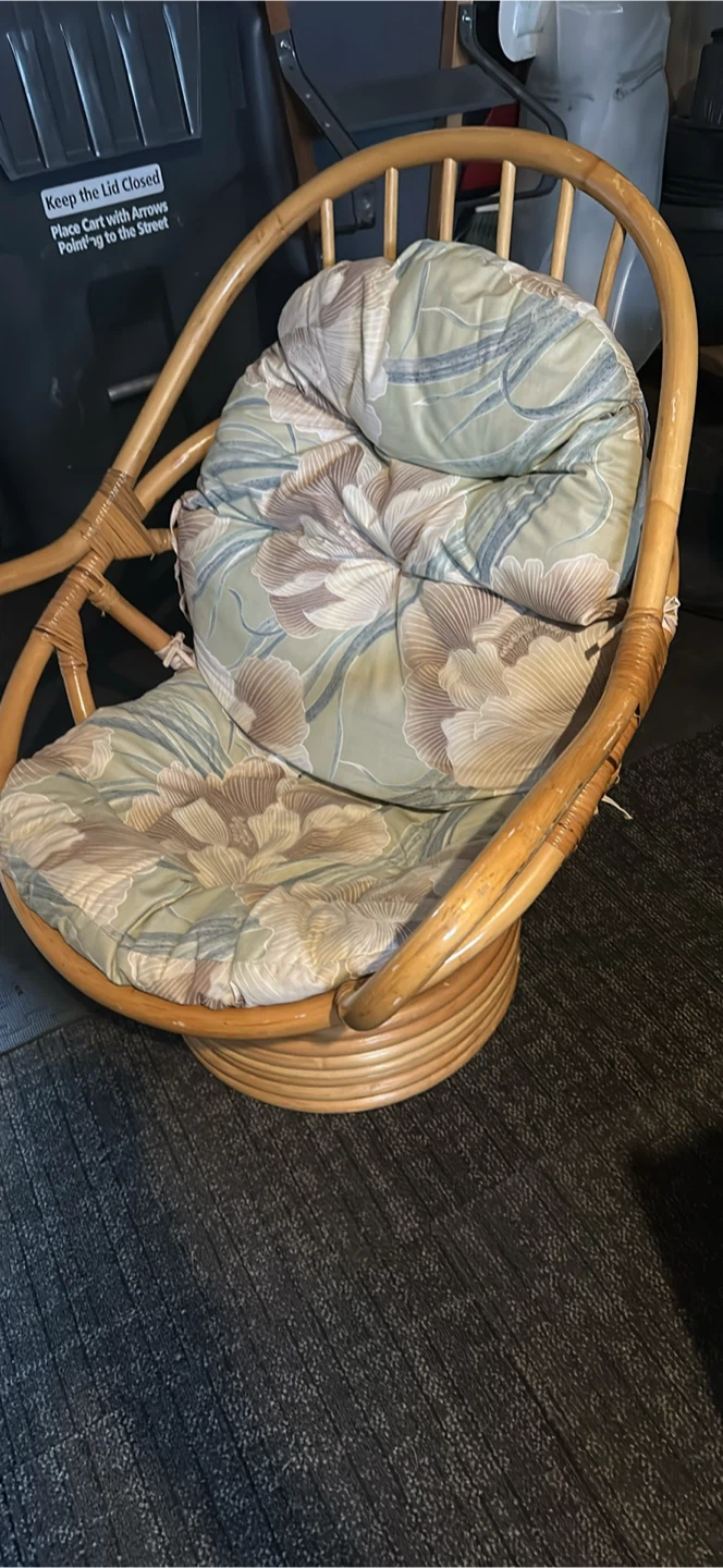 Rattan Swivel Chair with Floral Cushions